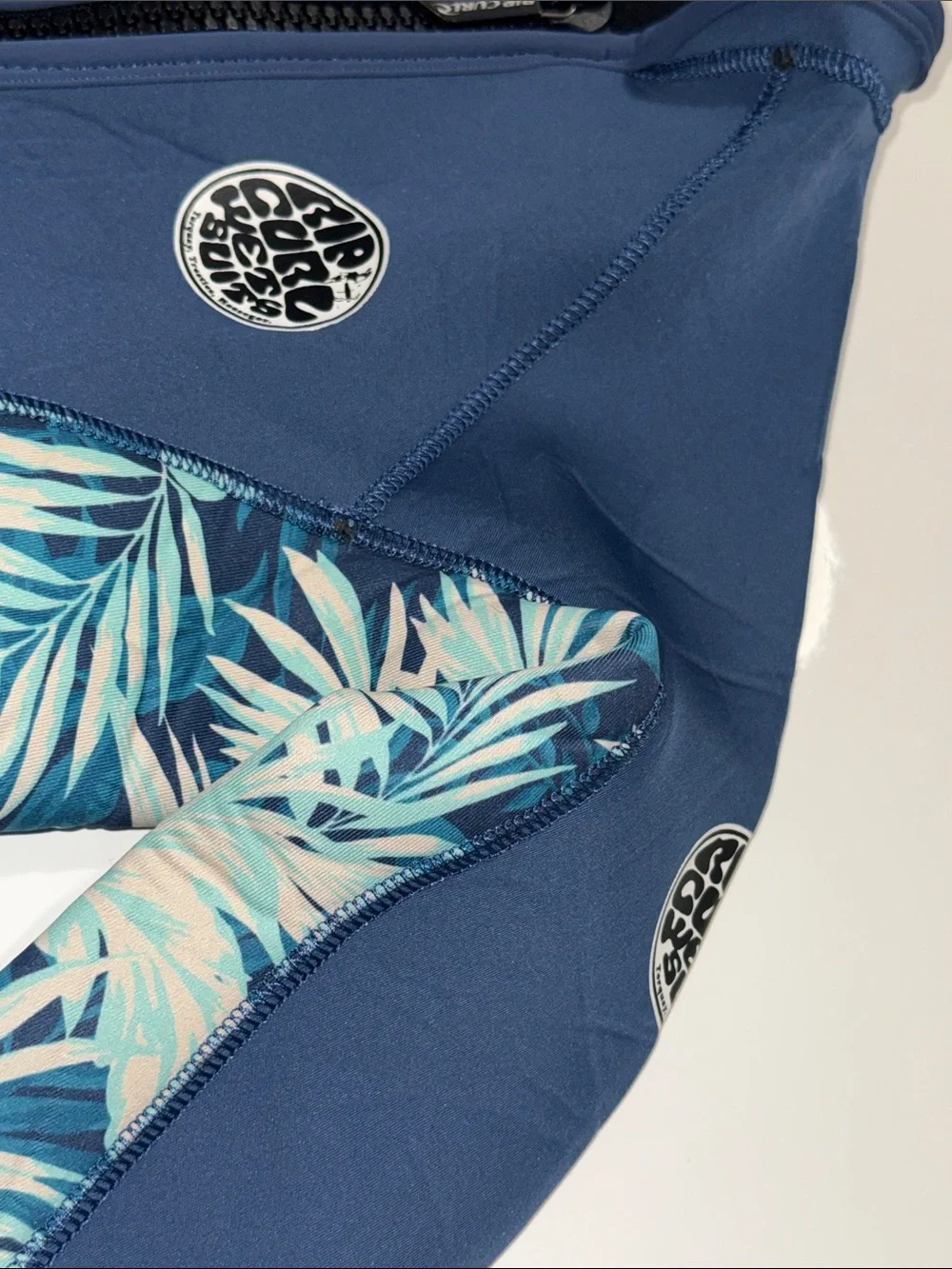 Rip Curl Navy One-Piece Wetsuit with Teal Floral Panels size